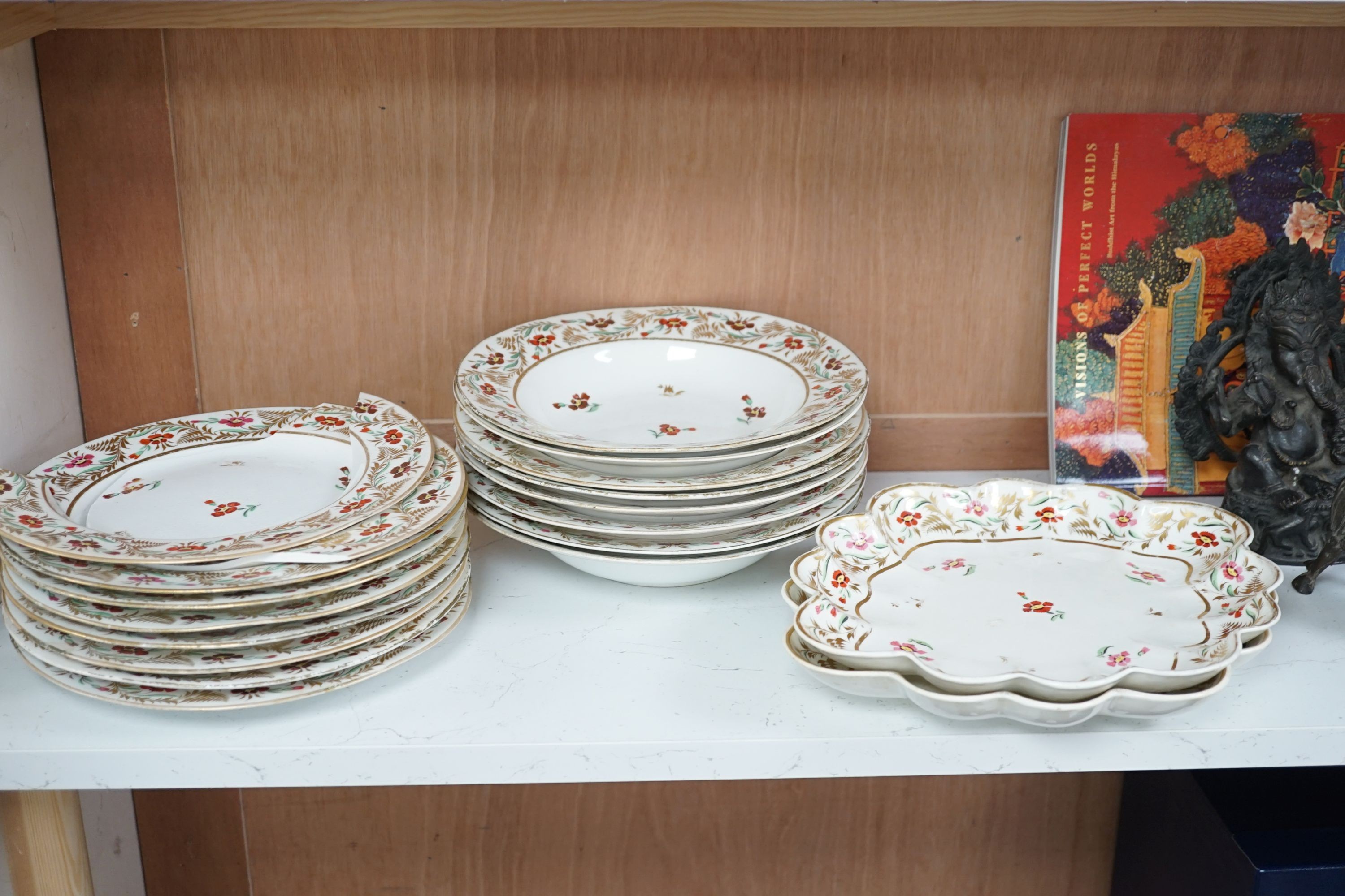 An early 19th century Derby seventeen-piece part dinner set, lobed oval serving dishes 31cm.